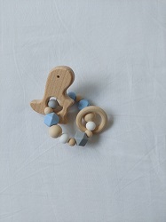 Hochet dinosaure bleu poudré